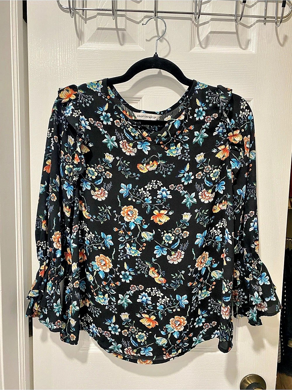 Counterparts Floral Ruffle Sleeve Blouse in Black & Blue